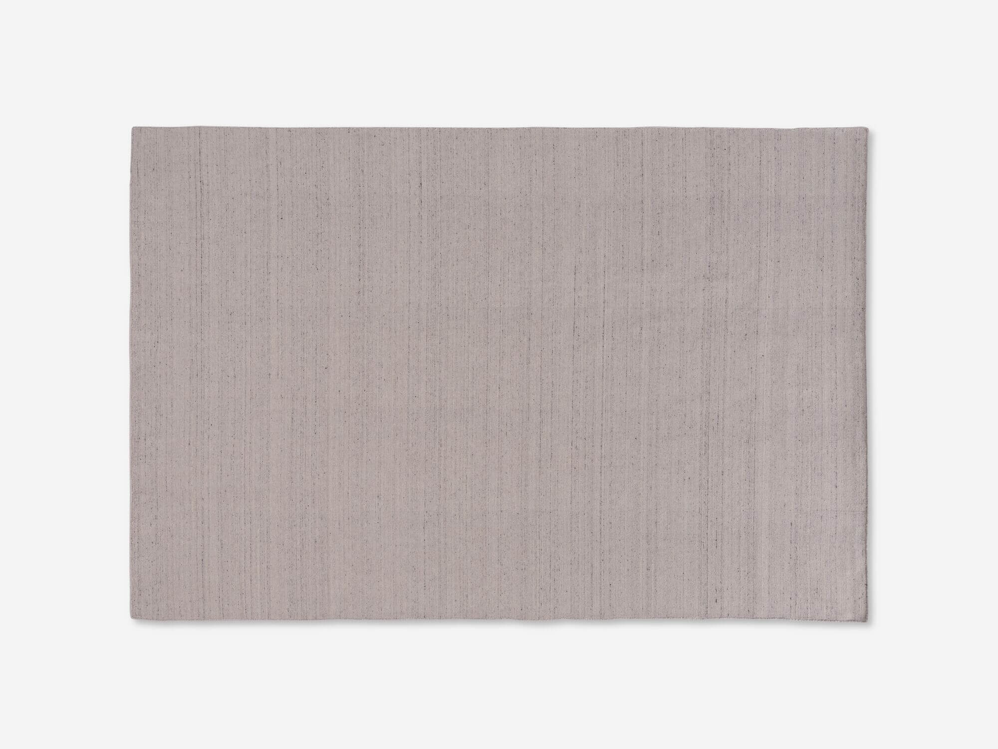 Top view of large grey woven area rug